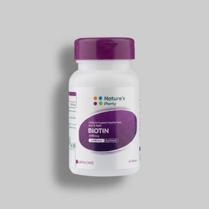 مکمل تقویت پوست مو و ناخن نیچرز پلنتی مدل بیوتین 10mg 60 عددی بدون لاکتوز با حفظ استحکام و سلامت و کاهش چین و چروک